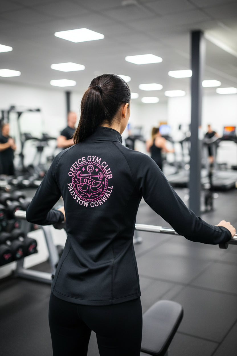 Navy jacket with pink and white text on a white background